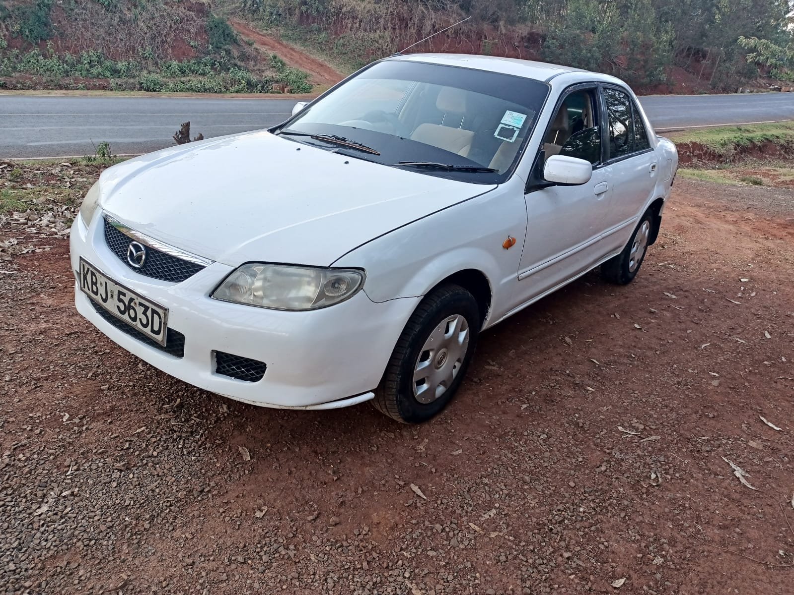 Mazda Familia 220k ONLY You Pay 20% DEPOSIT TRADE IN OK